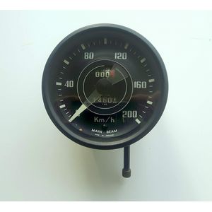 Rally Speedo TR4-4A flat glass instrument shown reading Kilometres